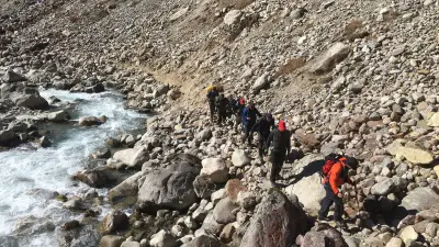 Group walking through a valley