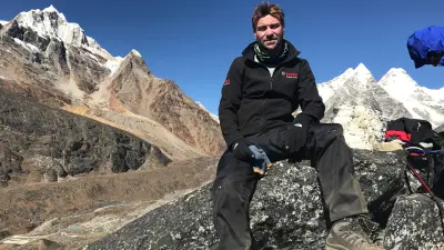 Steve sat on a rock